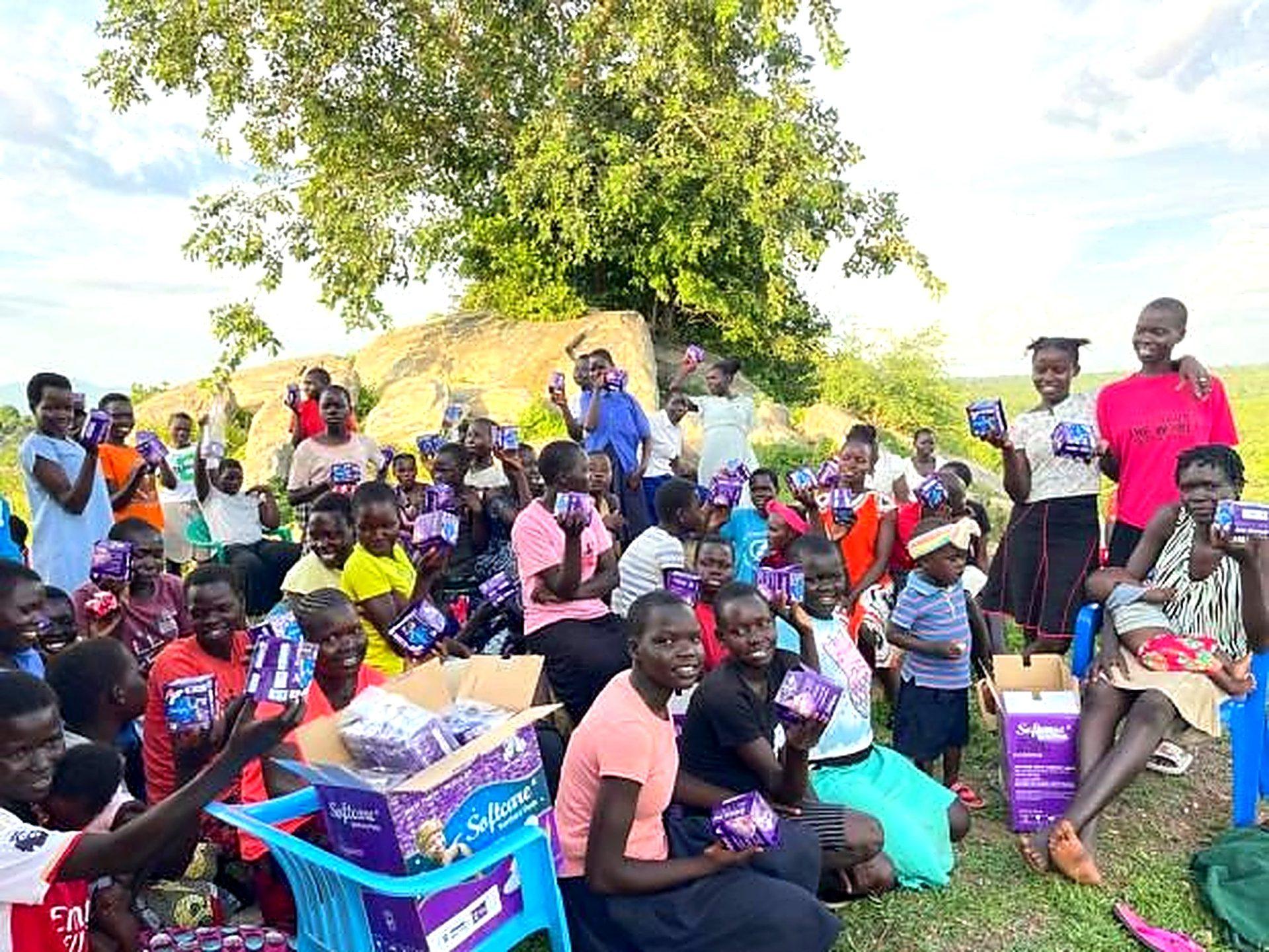 Community members receiving support from Kica Hope Restoration Mission